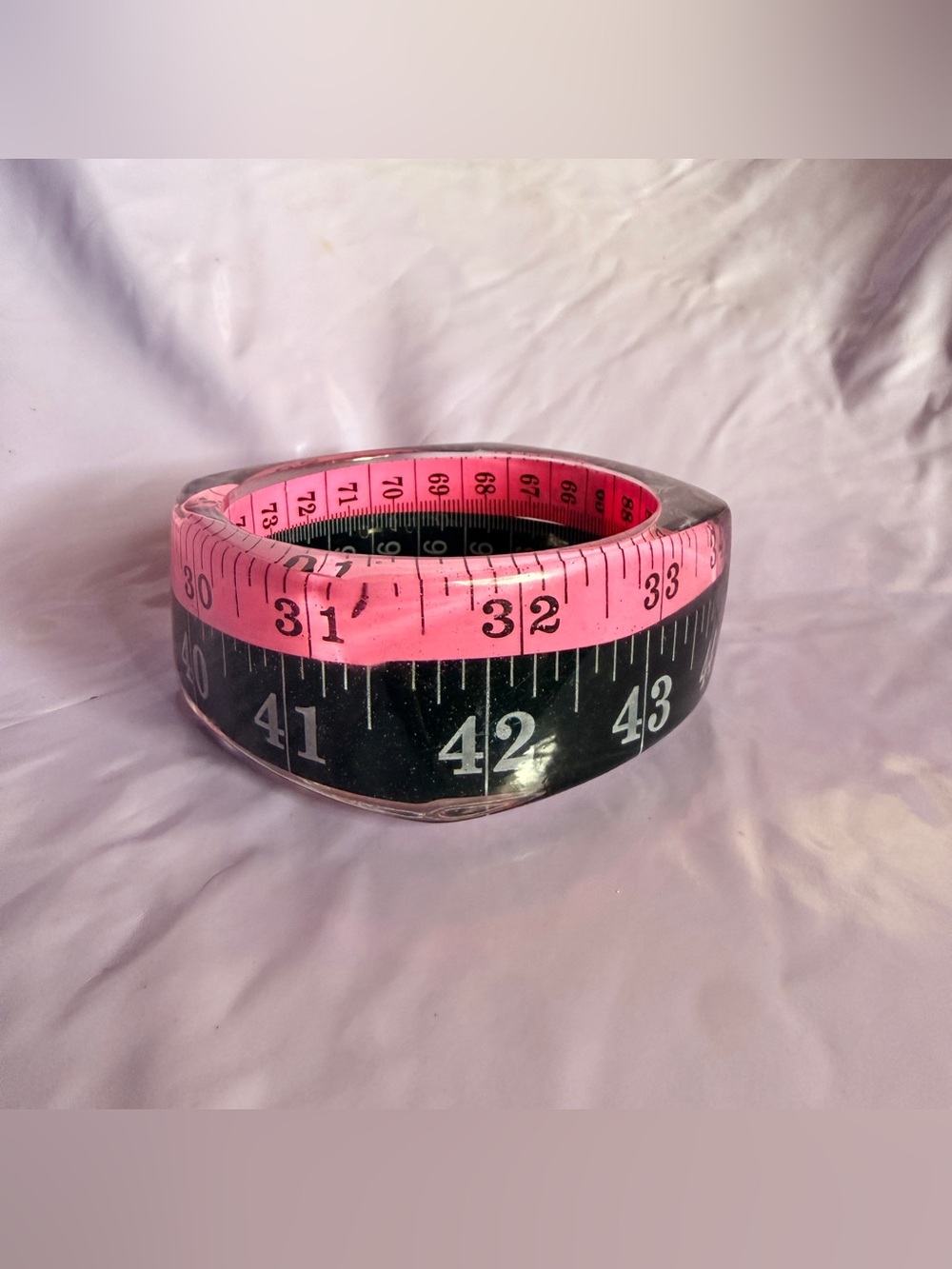 Black and pink measuring tape bangle